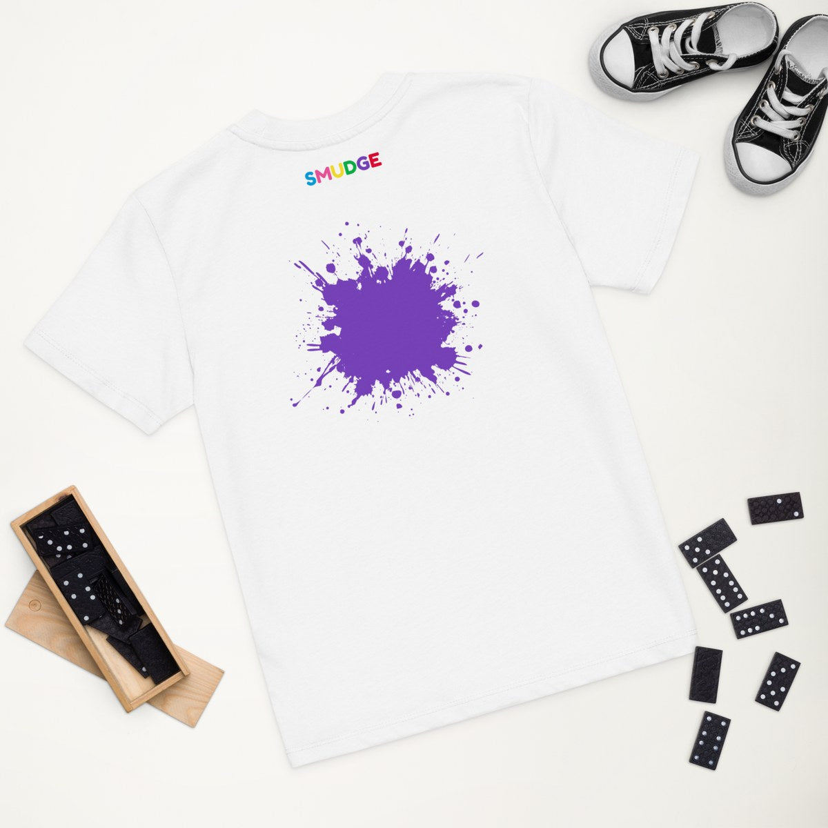 White organic kids' T-shirt with the Purple Splash & Back Neck Logo design, styled flat lay