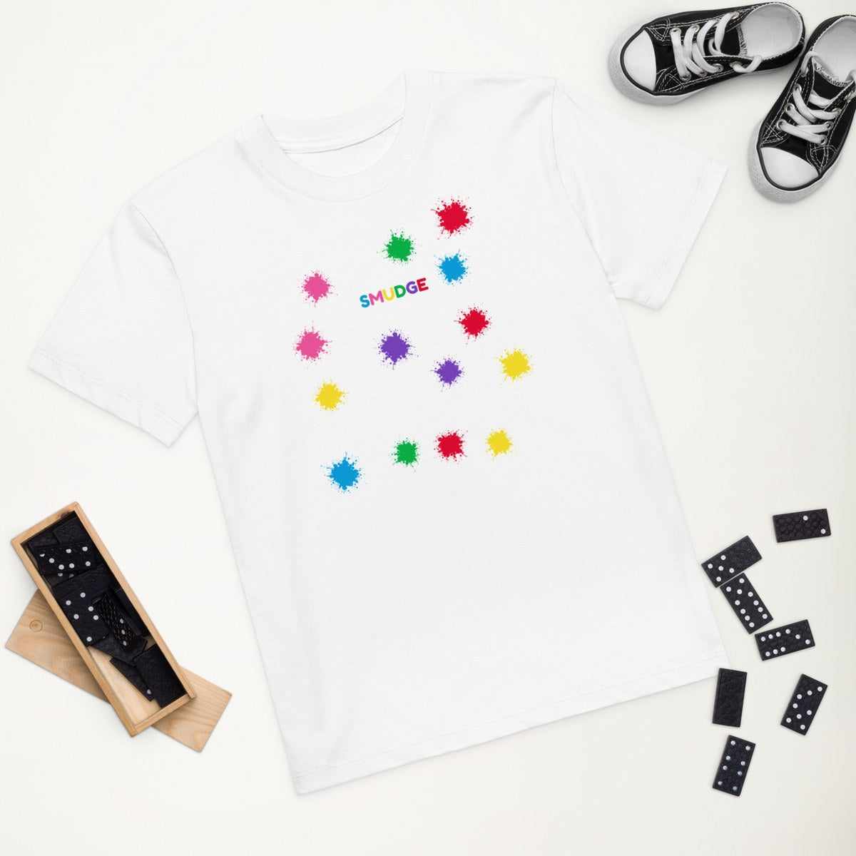White organic kids' T-shirt with the Splash Scatter design, styled flat lay