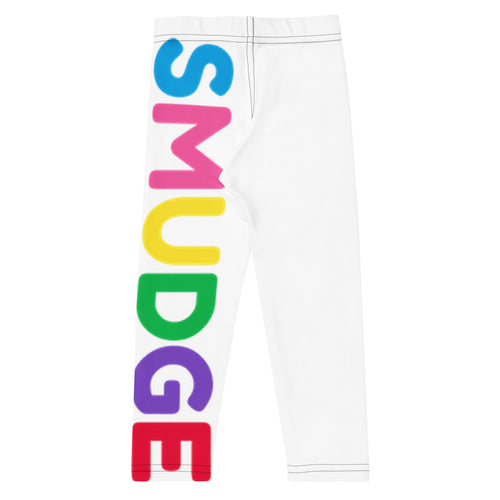 White kids' leggings with a large multicolour SMUDGE wordmark down one leg