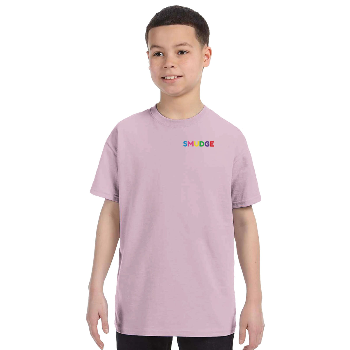 Boy wearing the Light Pink kids' T-shirt with a small SMUDGE wordmark at the top right of the chest