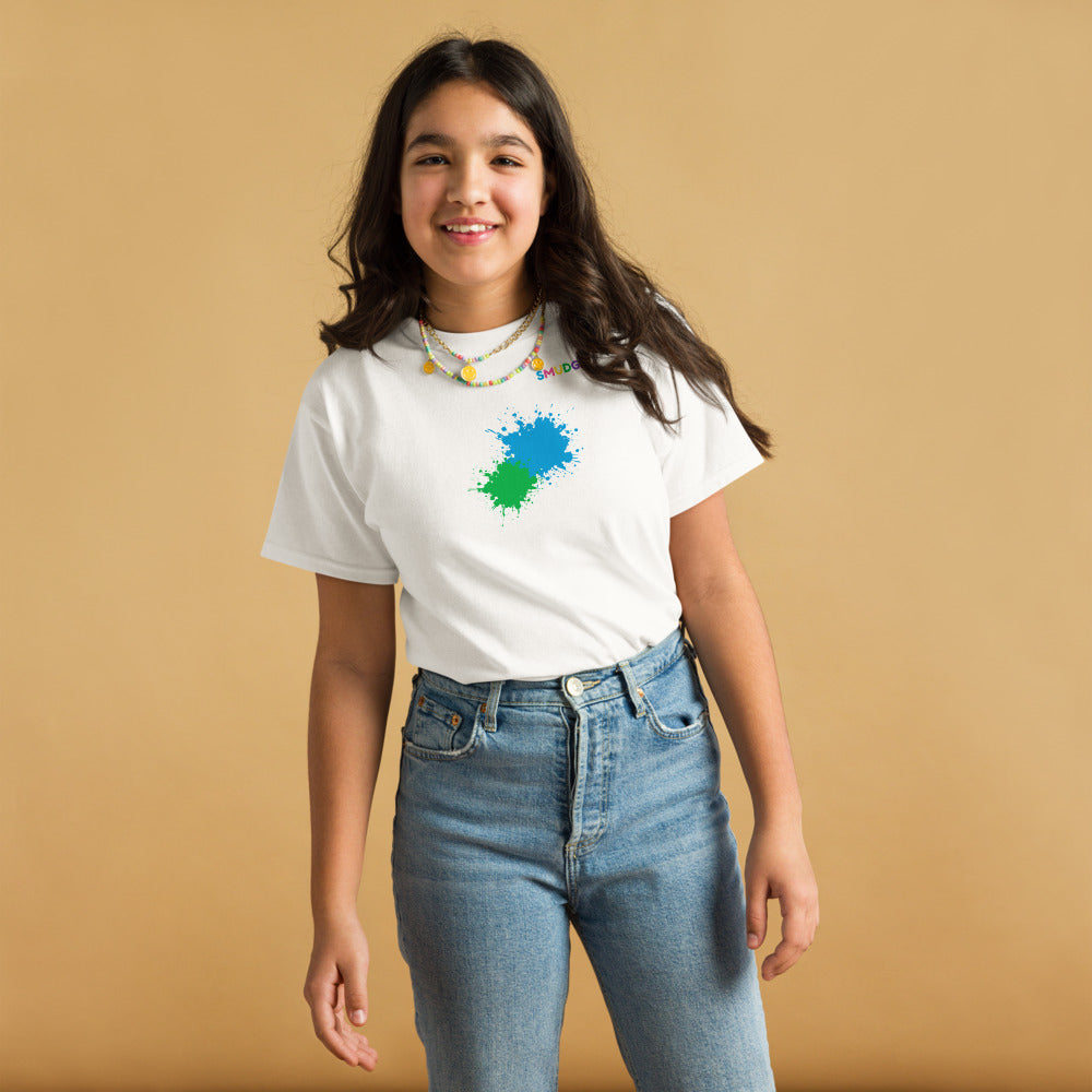 Child wearing a white SMUDGE youth t-shirt with the Cyan and Green Front Pair design, front view, studio backdrop