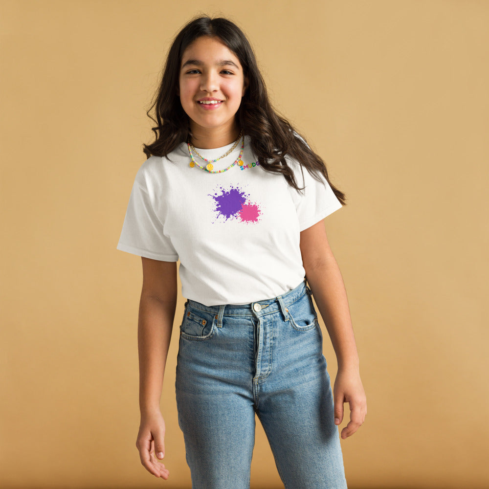 Child wearing a white SMUDGE youth t-shirt with the Purple and Pink Front Pair design, front view, studio backdrop
