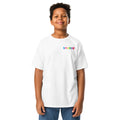 Boy wearing the white youth T-shirt with a small SMUDGE wordmark at the top right of the chest